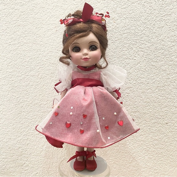 Porcelain Doll Holding Heart